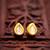 gold-toned teardrop kundan stud earrings