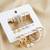 elegant gold plated pearl & crystal hoop earring combo set for women (pack of 9 pairs)