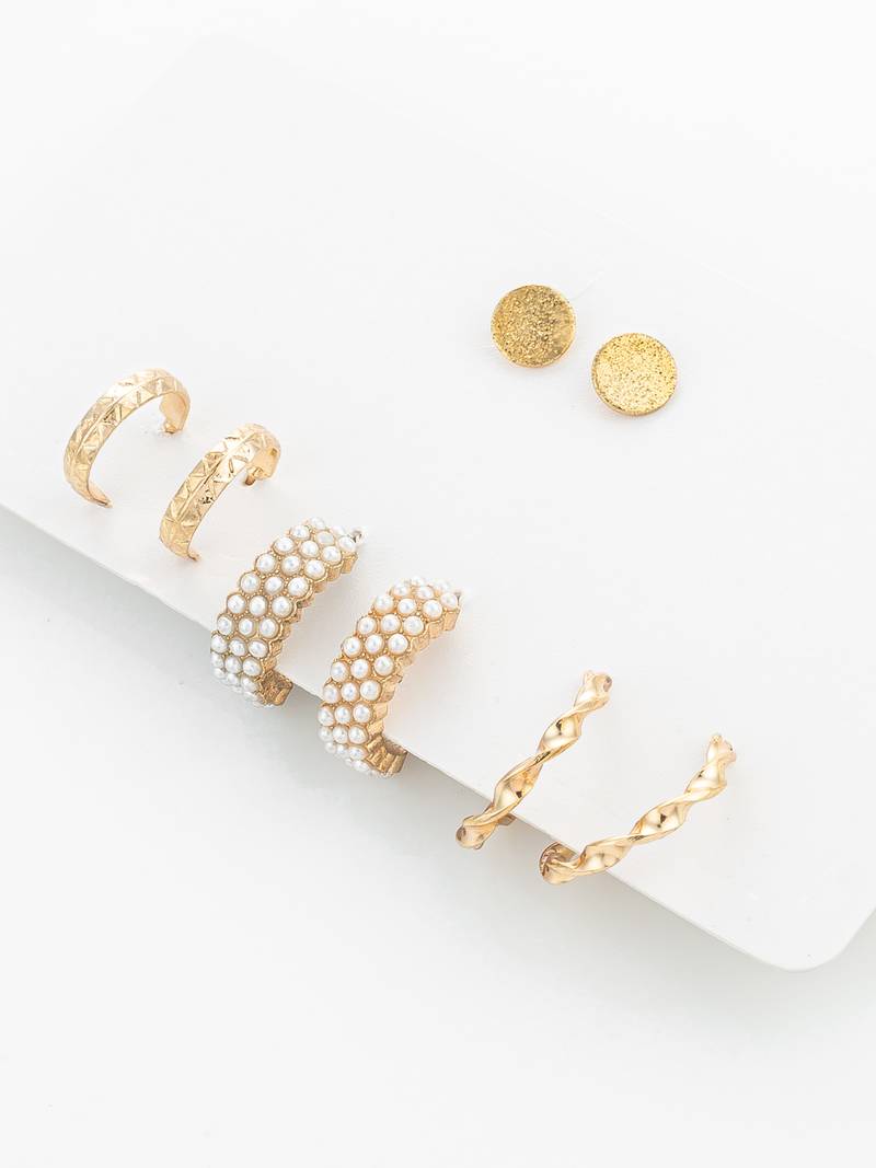 gold plated pearl huggie and textured hoop set