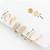 gold plated pearl huggie and textured hoop set