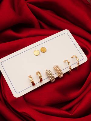 gold plated pearl huggie and textured hoop set 4