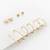 gold plated geometric stud and hoop earring set