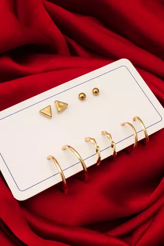 gold plated geometric stud and hoop earring set