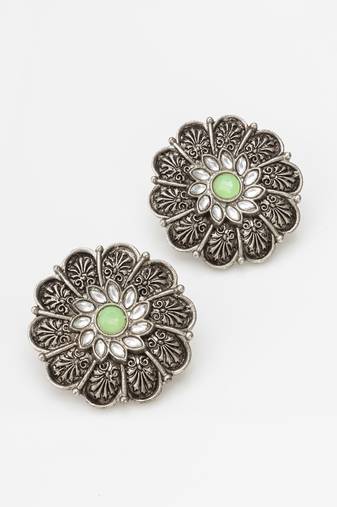 oxidized floral motif stud earrings with green stone