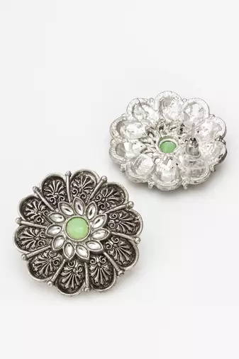 oxidized floral motif stud earrings with green stone
