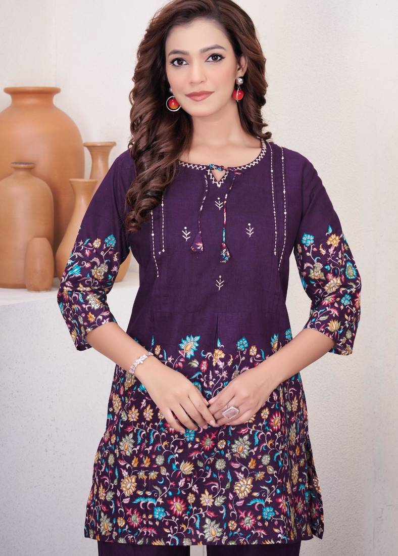 Purple cotton blend embroidered kurta sets