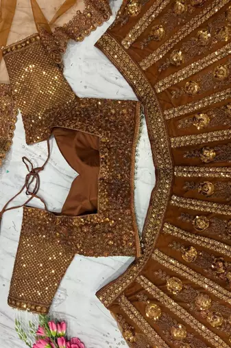 Golden Ember Butterfly Net Lehenga Choli with Heavy Glass Sequins, Dori & Embroidery Work (3.5 Mtr Flair)