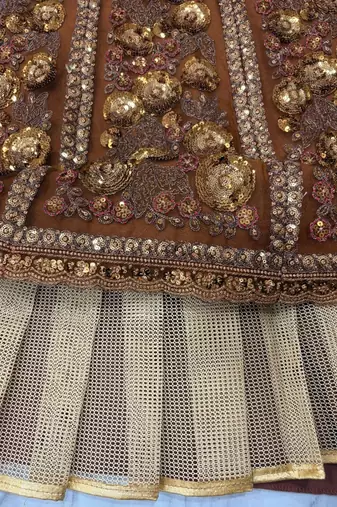 Golden Ember Butterfly Net Lehenga Choli with Heavy Glass Sequins, Dori & Embroidery Work (3.5 Mtr Flair)