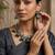 Oxidized silver-tone lotus motif jhumki necklace set with emerald-green accents