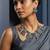 Oxidized silver-tone lotus motif jhumki necklace set with blue accents