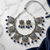 Oxidized silver-tone lotus motif jhumki necklace set with blue accents