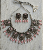 Oxidized silver-tone lotus motif jhumki necklace set with pink  accents