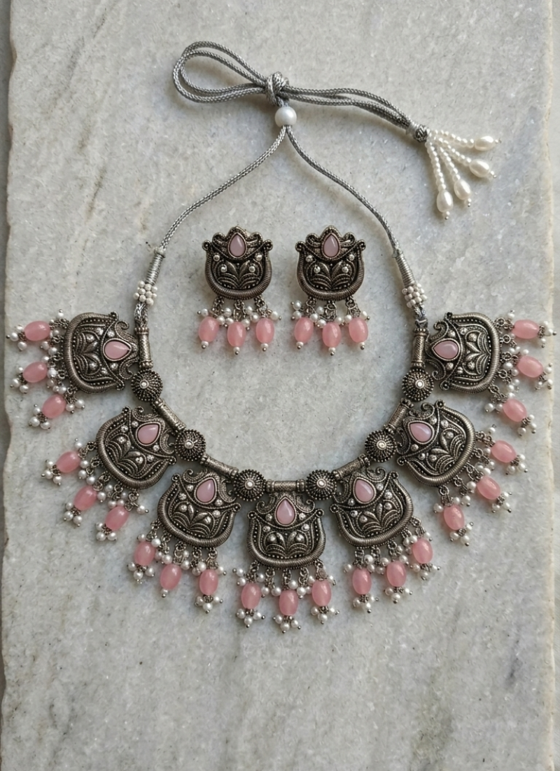 Oxidized silver-tone lotus motif jhumki necklace set with pink  accents