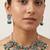 Oxidized silver-tone lotus motif jhumki necklace set with emerald-green accents
