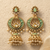 Traditional mint green meenakari & kundan antique gold-tone jhumka earrings with pearl drops