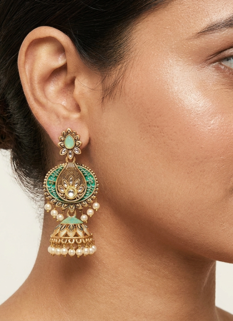 Traditional mint green meenakari & kundan antique gold-tone jhumka earrings with pearl drops
