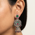 Oxidized silver-tone floral chandbali jhumka earrings with ruby & emerald-color accents