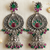 Oxidized silver-tone floral chandbali jhumka earrings with ruby & emerald-color accents