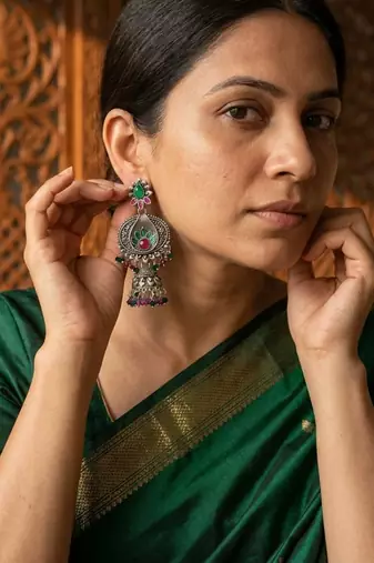 Oxidized silver-tone floral chandbali jhumka earrings with ruby & emerald-color accents