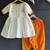 Off white printed cotton silk orange dhoti kurta set