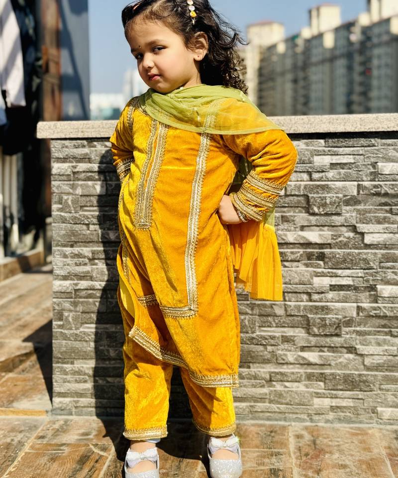 Mustard yellow embroidered velvet kurti set