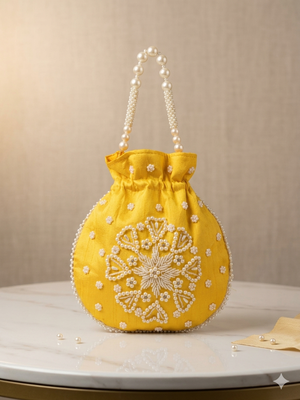 yellow pearl embroidered potli bag  1