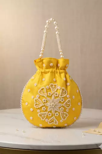 yellow pearl embroidered potli bag 
