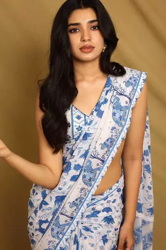 white printed georgette saree with unstitched blouse