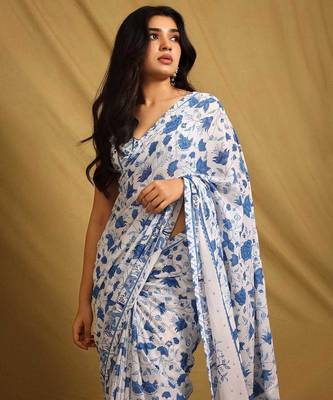 white printed georgette saree with unstitched blouse 4