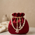 maroon pearl embroidered potli bag 