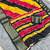 yellow striped georgette saree with unstitched blouse