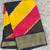yellow striped georgette saree with unstitched blouse