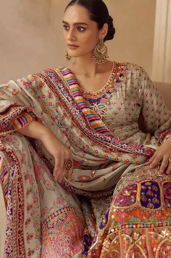 Light grey crepe silk  palazzo suit with print work - free size stitched 42