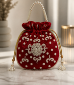 red pearl embroidered potli bag