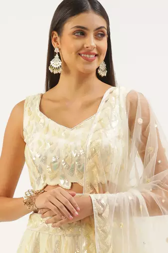 light yellow net embroidered lehenga choli with dupatta