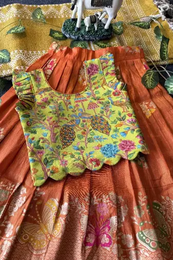 Girls orange soft tissue butterfly print lehenga choli with 3d weaving work
