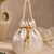 off white pearl embroidered potli bag