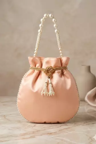 pastel peach pearl embroidered potli bag 