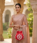 red peach pearl embroidered potli bag 