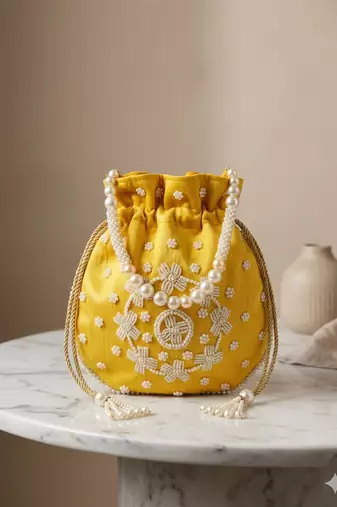yellow peach pearl embroidered potli bag 