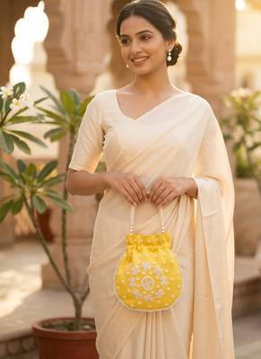 yellow peach pearl embroidered potli bag  2