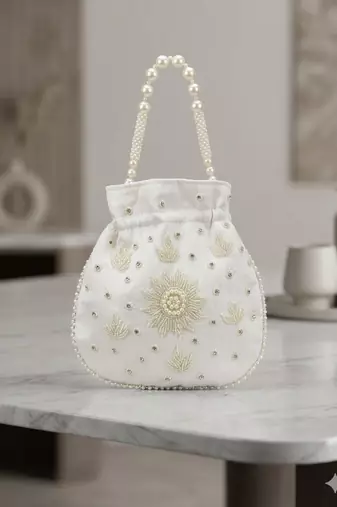  off white handcrafted potli bag