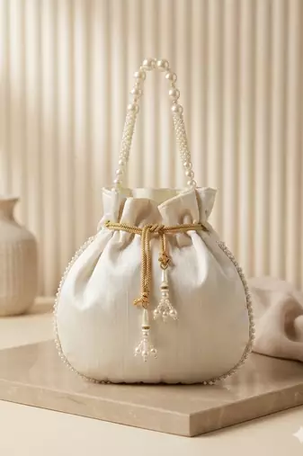  off white handcrafted potli bag