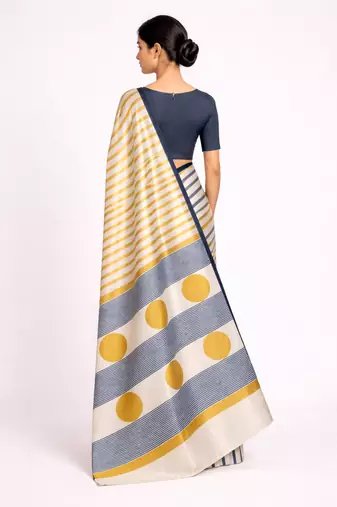 Cream printed satin saree with blouse piece