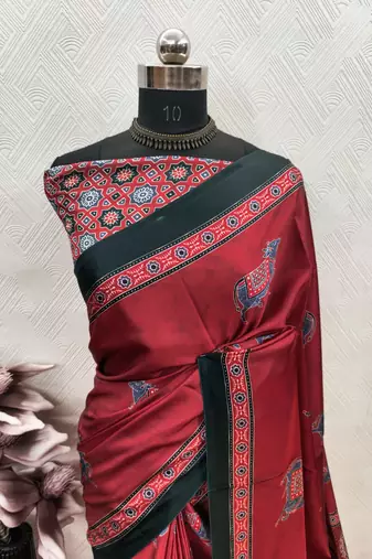 Red printed satin saree with blouse piece