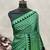 Green printed satin saree with blouse piece
