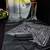 Black printed satin saree with blouse piece