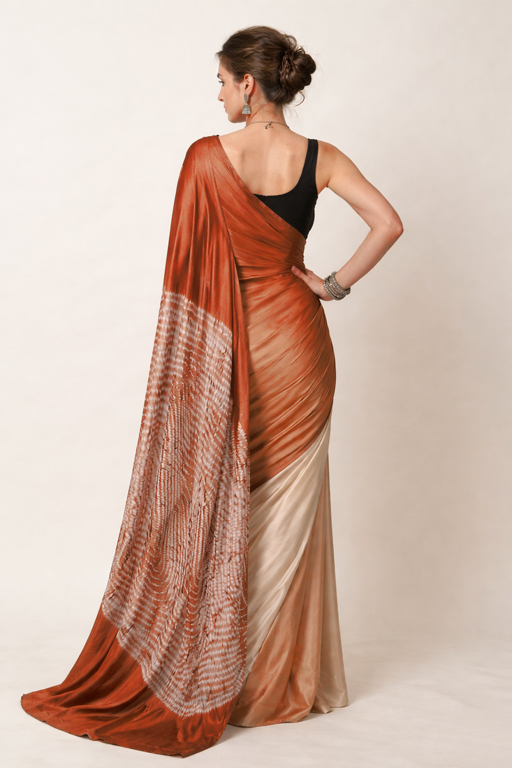 Rust printed satin saree with blouse piece