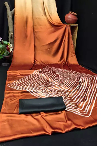 Rust printed satin saree with blouse piece