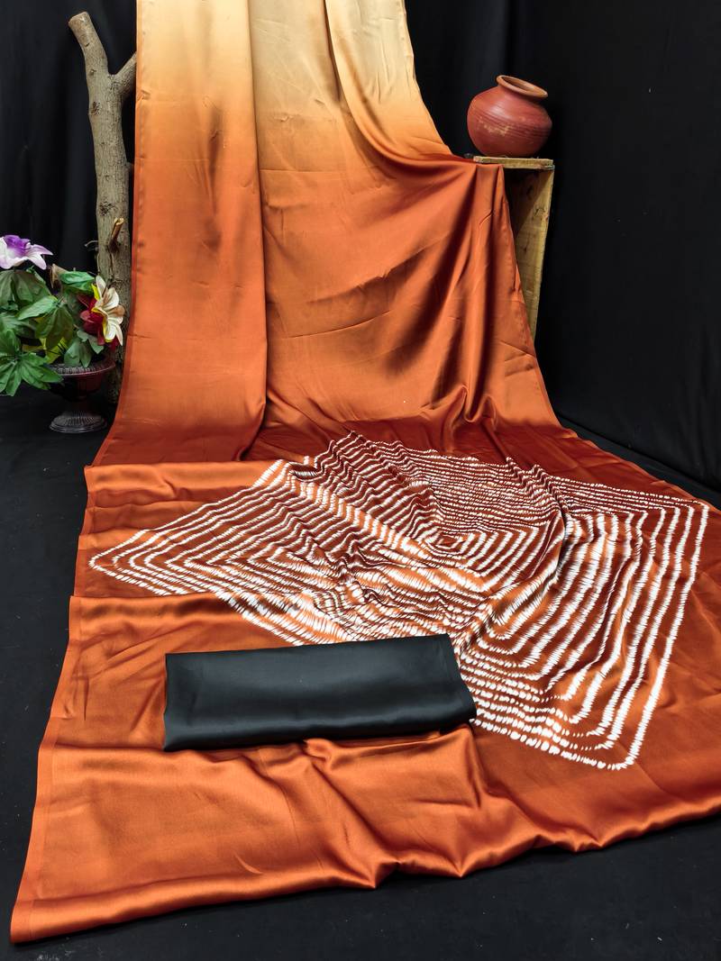 Rust printed satin saree with blouse piece